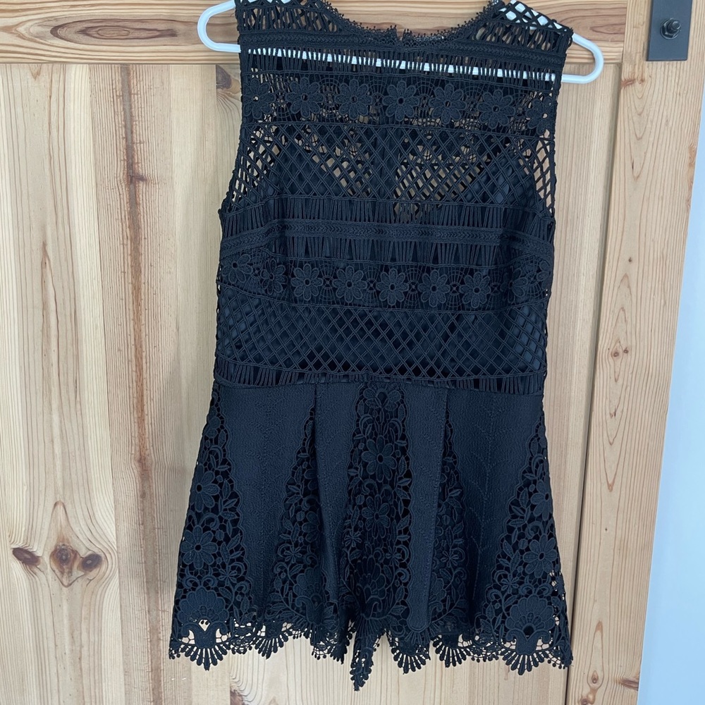 Runway high end top. Gorgeous, very unique